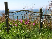 11PortPFence  A old Bedstead makes an ornamental fence on the Duskey path