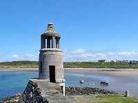15PortLogan  Another view of Port Logan Lighthouse.The origins of Port Logan date back to 1682, when the local McDouall lairds built a pier and a village which was originally called Port Nessock.