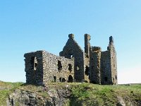9PortPcast  The Dunskey Castle remains seen atop the cliffs