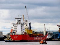 Tyne9  " HHL Lagos" supported by tugs and the Pilot boat steadily making its way upriver.